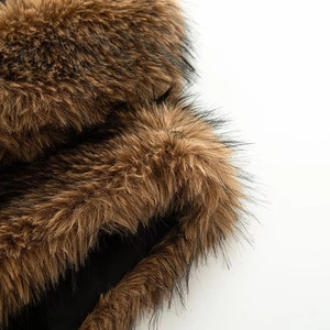 Macro shot of faux fur texture showing soft brown fibers with black tips and dense pile