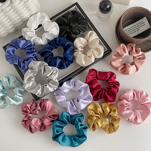 Collection of 13 colorful satin silk hair scrunchies with elegant glossy finish for women