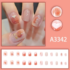 Pink gradient press-on nails set with 24 pieces featuring rose decor and heart accents
