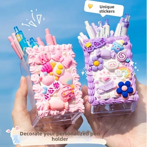 DIY cream glue pencil holder with 3D charms and acrylic drawers against blue sky