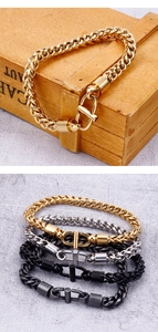 Detail of 6mm titanium steel link chain bracelets featuring a decorative toggle clasp closure