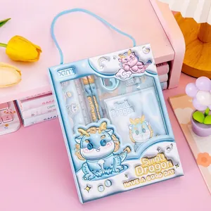 Detailed view of the blue cartoon dragon stationery gift set for primary school students
