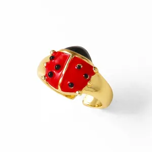 Bague coccinelle dorée avec émail rouge et noir, design ouvert ajustable de haute qualité