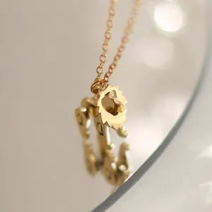 Cute lion pendant necklace in 14K gold plated titanium steel with mirror reflection