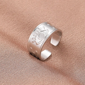 Silver adjustable stainless steel open ring with matte evil eye totem engraving