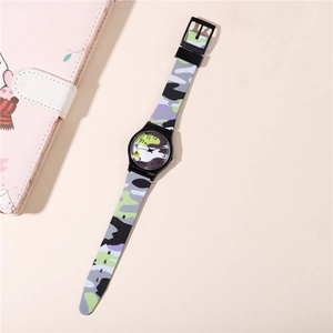 Detail of purple camouflage quartz watch with clear numeric scale on beige background