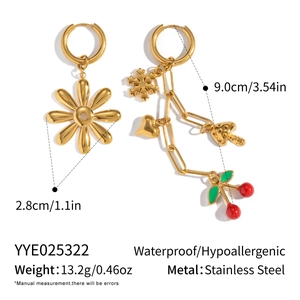 Detailed view of asymmetrical 18K gold floral and cherry charm earrings with dimensions