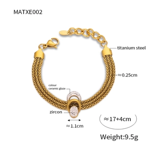 Detail of titanium steel mesh bracelet with colorful enamel and zircon interlocking ovals