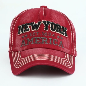 Detailed shot of vintage red cotton baseball cap with New York 3D embroidery