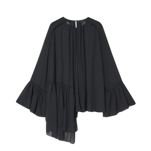 Detail of black chiffon long sleeve shirt with asymmetric hem and ruffle trim