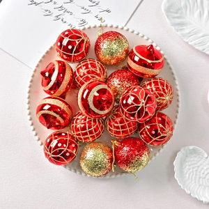 16-pack red and gold Christmas ball ornaments with mixed textures in a white tray