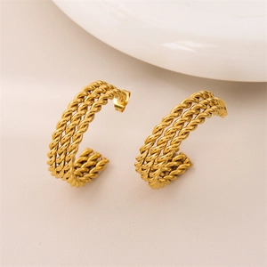 Vintage 18k gold twisted triple-rope hoop earrings in a polished C-shaped design