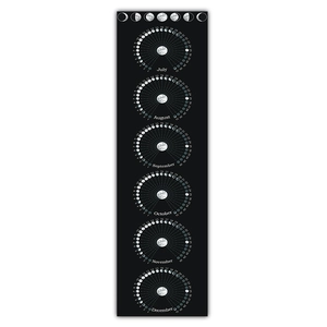 Macro detail of 2025 lunar calendar wall hanging showing July to December moon phases