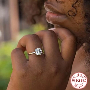 Macro detail of high-quality 925 sterling silver diamond ring on model's hand