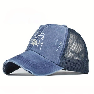 Washed navy blue DOG MOM ponytail truck hat with distressed brim and breathable mesh