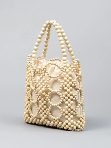 Handmade cream beaded tote bag with bohemian woven pattern and drawstring canvas lining