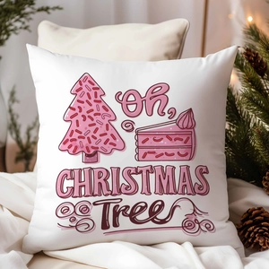 Detail of a white Christmas pillowcase with a pink tree and festive holiday patterns