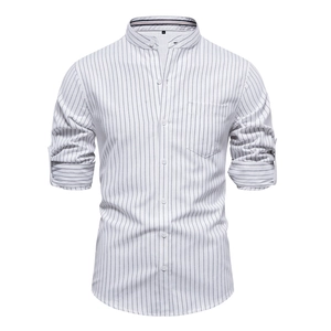 Detail of slim-fit mandarin collar shirt with black vertical stripes and chest pocket