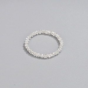Minimalist 925 sterling silver ring with shimmering textured finish in silver color