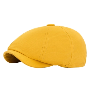 Classic mustard yellow cotton newsboy cap with octagonal design and stitch details