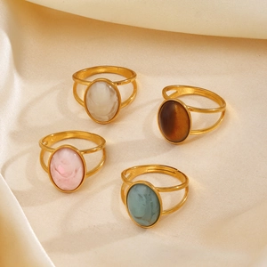 Minimalist gold plated stainless steel rings with colorful resin inlay on silk