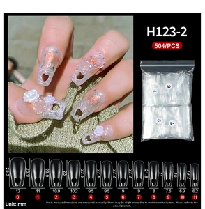 Size chart for heart-shaped cutout coffin false nails showing detailed width and length