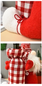 Detailed close-up of knit fabric and plush beard on faceless gnome wine bottle cover