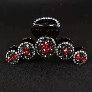 Elegante pinza per capelli nera con strass rossi e neri per acconciature da donna