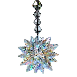 K9 starburst crystal suncatcher with iridescent faceted beads on a white background