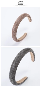 Close-up of sparkling rhinestone headbands in rose gold and grey with non-slip lining