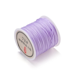 Close-up of 0.8mm lavender purple polyester cord roll for DIY handmade jewelry crafts