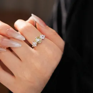 Sparkling silver flower open ring with yellow oval gemstone and zircon accents