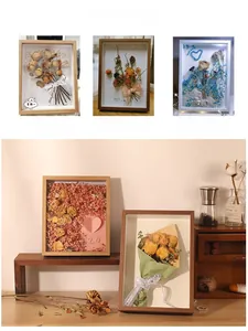 Detail of wooden shadow box frames with 3D dried roses and Just For You ribbon accents
