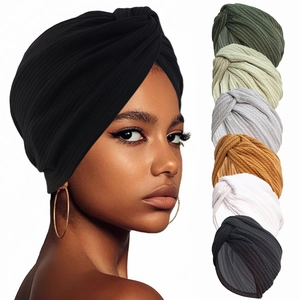 Elastic turban headwrap with ribbed texture shown in black and multiple assorted colors