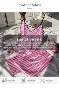 Detail of pink striped faux silk pajama set showing its smooth five satin weave fabric