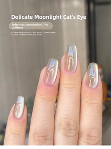 Close-up of white moonstone ceramic cat eye nail polish with magnetic shimmer effect