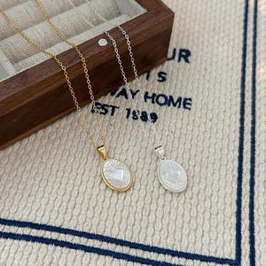 925 sterling silver heart shell necklace in gold and silver finish with sunburst texture