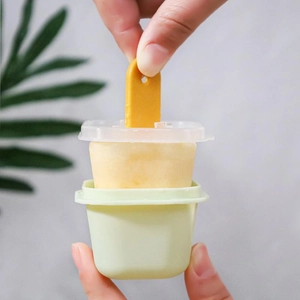 Creative ice pop mold with green base and yellow stick for homemade mini popsicles