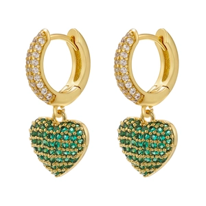 Detailed close-up of gold heart earrings featuring green gemstone pave and white crystals