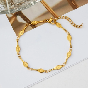 Gold-plated tennis racket textured link bracelet with oval mesh pattern and lobster clasp