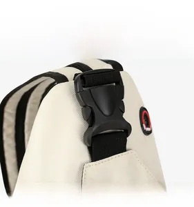 Detail view of durable thick plastic buckle and reinforced black strap on Oxford chest bag