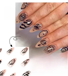 Detail of long almond press on nails featuring black hand-drawn eye and wave graffiti
