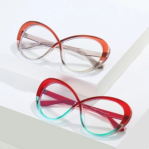 Detailed close-up of TR90 oversized frames with infinity cross design in gradient colors