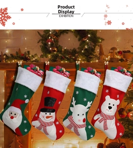 Set of four festive Christmas stockings with Santa, snowman, and reindeer icons