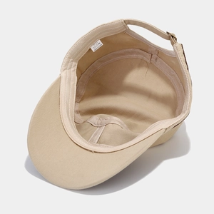 Beige cotton military cadet cap interior showing sweatband and adjustable metal buckle