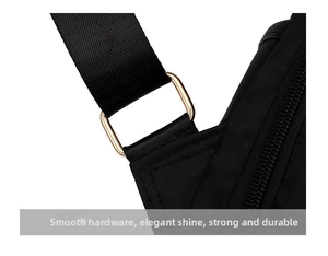 Detailed close-up of premium gold-toned metal buckles on black nylon quilted backpack