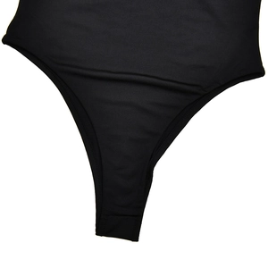Detail shot of the reinforced stitching on the black high-cut thong bodysuit