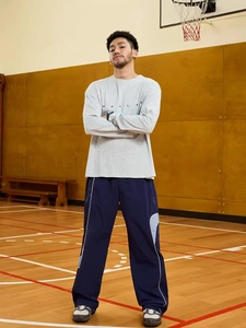 Men's navy loose casual sports trousers with side stripe and light grey long sleeve shirt