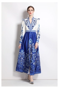 Detail of long sleeve floral dress with V-neck, blue print, and silk texture