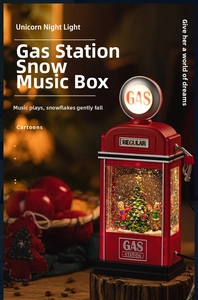 Close-up of vintage red gas station snow globe night light with Christmas tree detail
